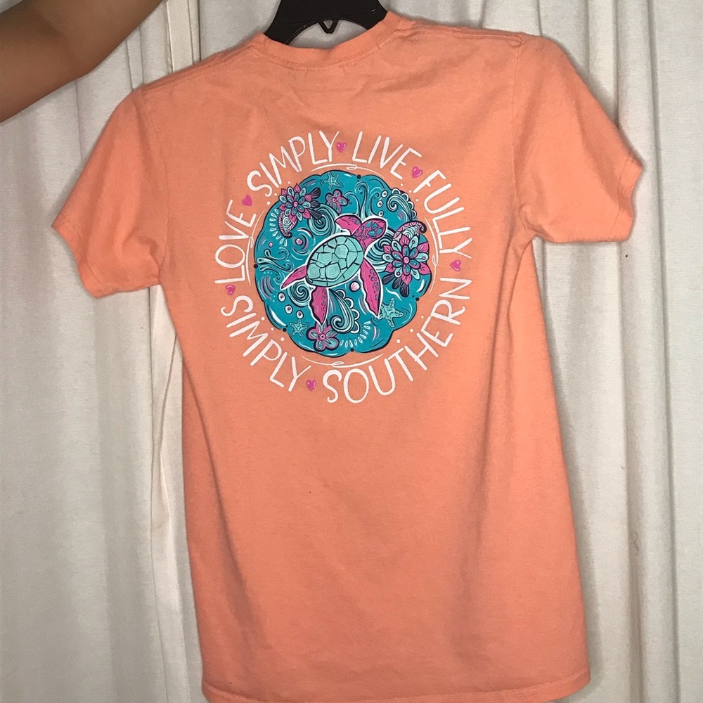 Simply Southern women’s orange short sleeve shirt.